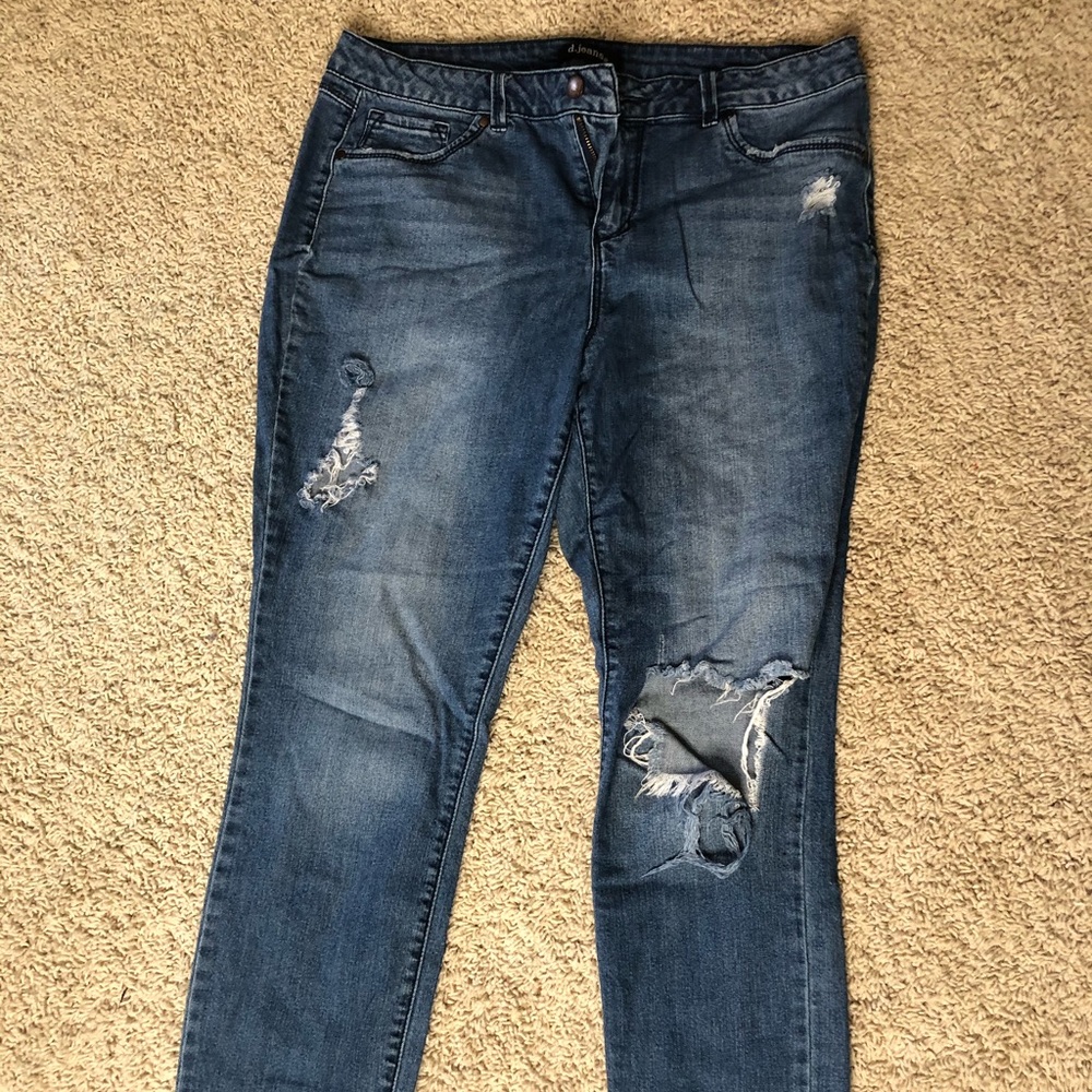Distressed and well-worn cropped jeans